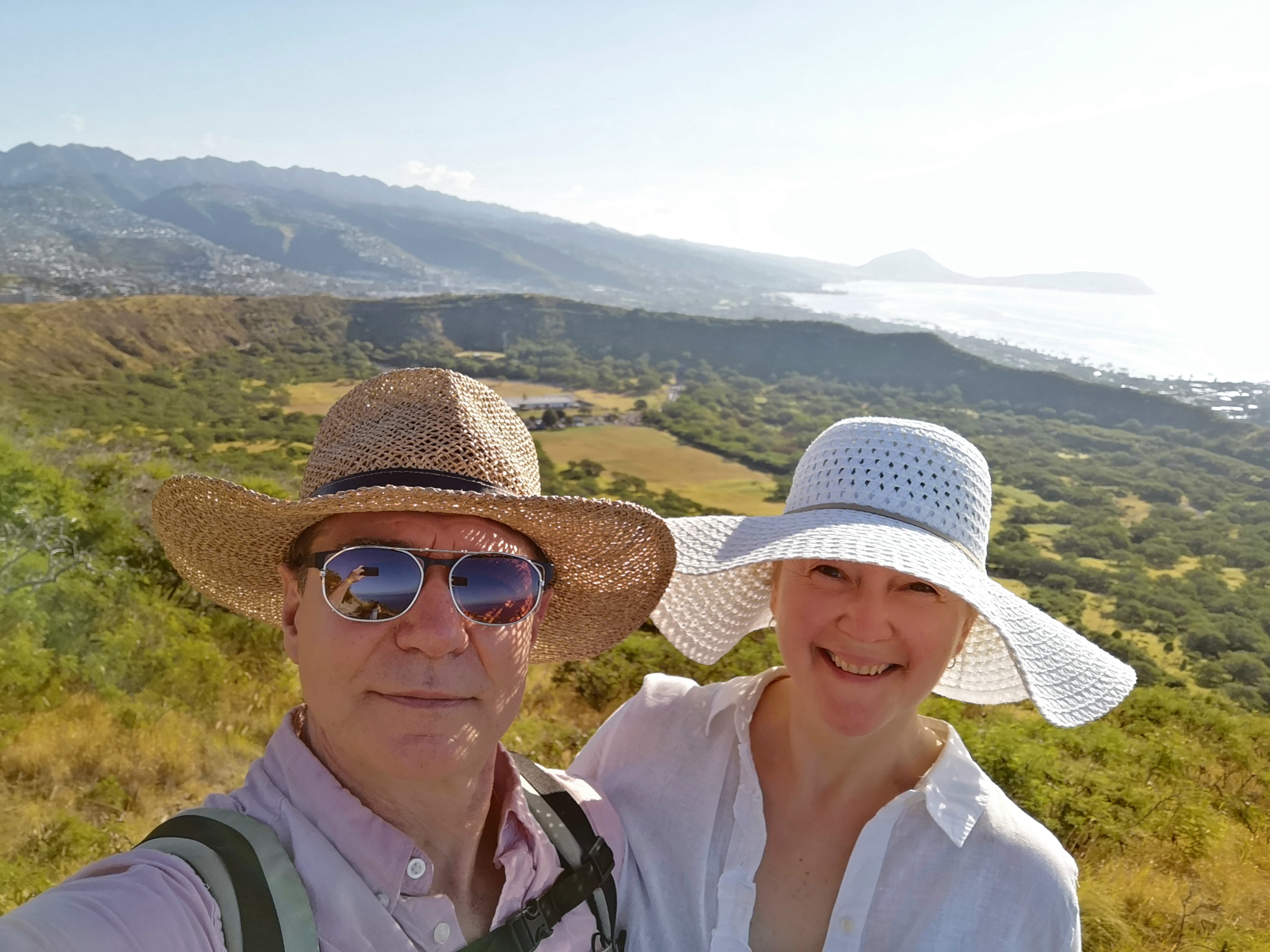 Smiling senior couple enjoying a hike together