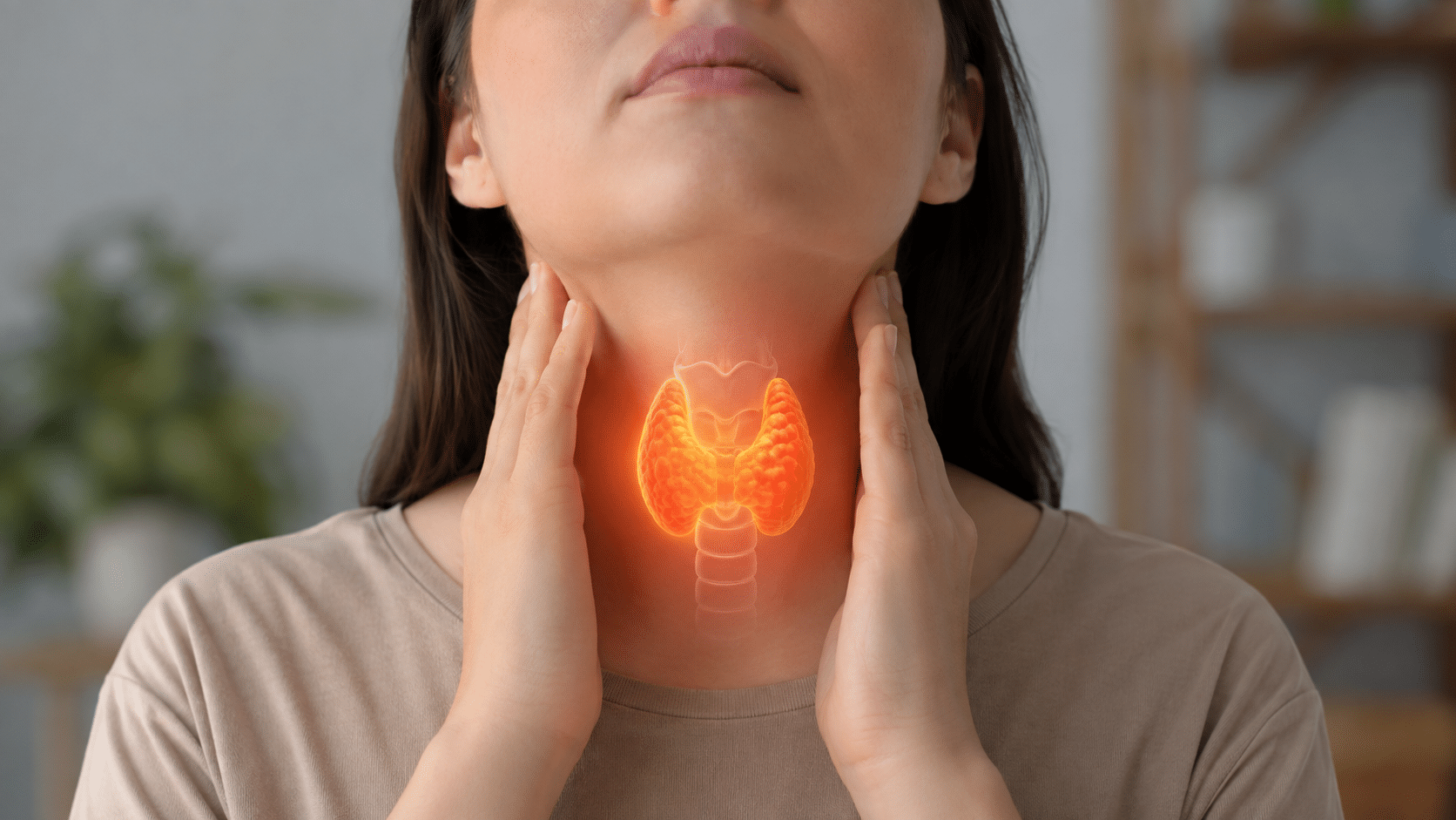 Person holding their throat, with an illuminated thyroid gland graphic over the neck indicating thyroid pain or injury